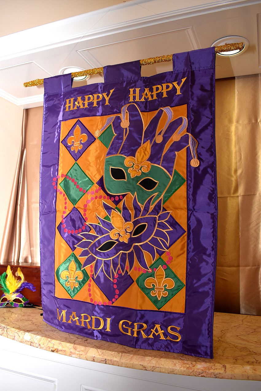 Purple, gold and green decorations adorned the yacht club.