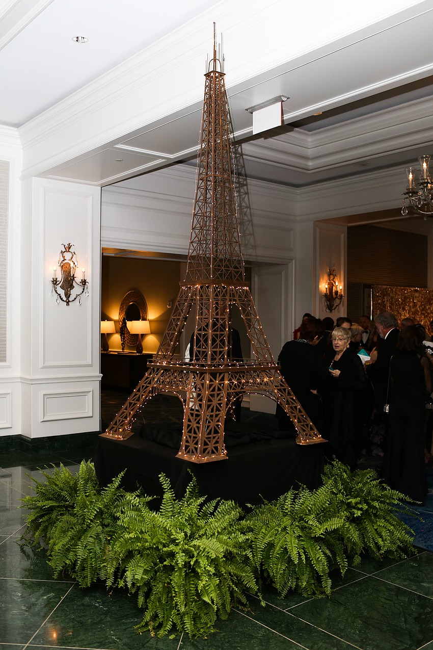 An Eiffel Tower was lit up at the entrance.