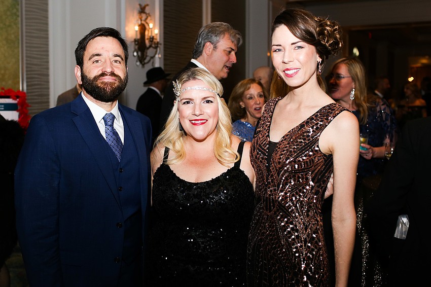 Doug and Erin Christy with Kelly Dowd