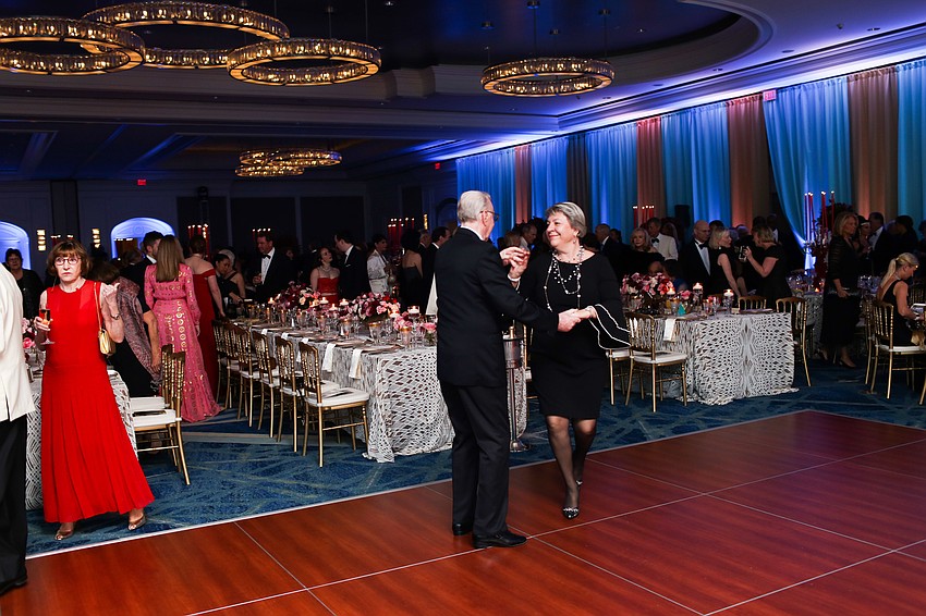 One couple braved the dance floor before dinner.