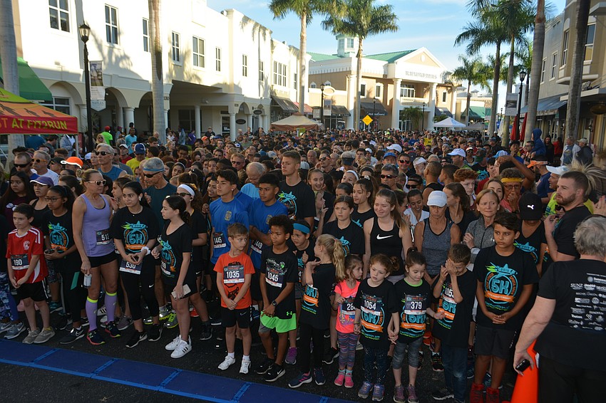 The 10th anniversary Take Stock in Children 5K set a record with more than 2,000 participants at Main Street at Lakewood Ranch.