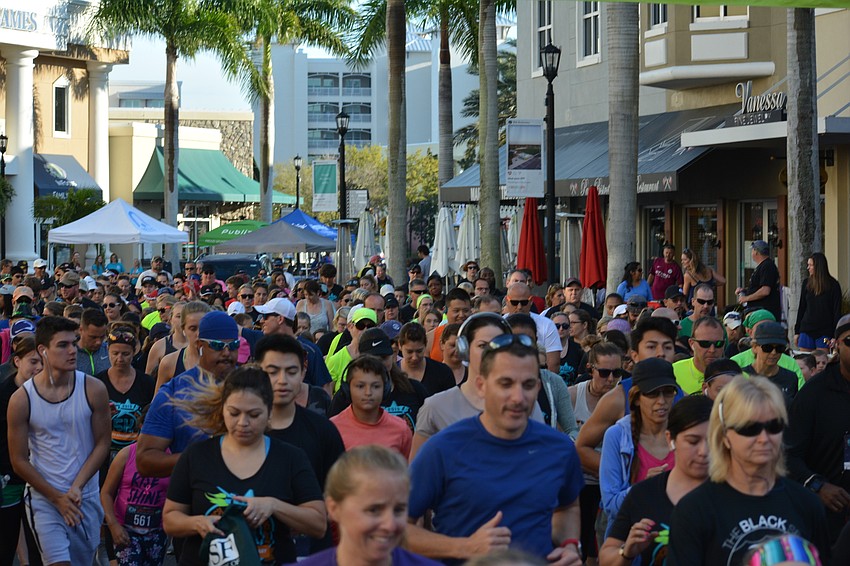 Runners try to find some elbow room at the start of the 5K.