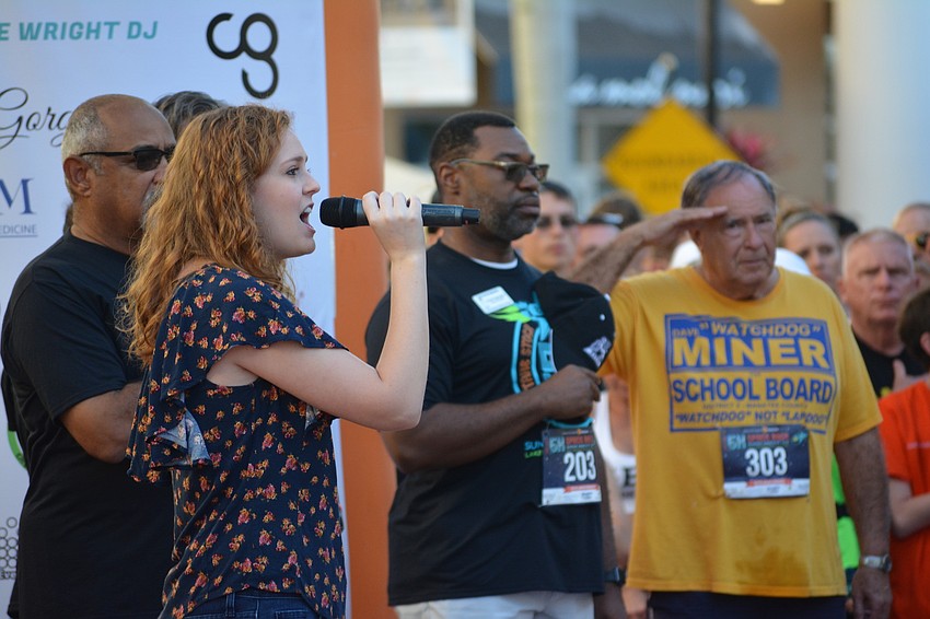 Sarasota's Nina Vannucci sings the National Anthem.