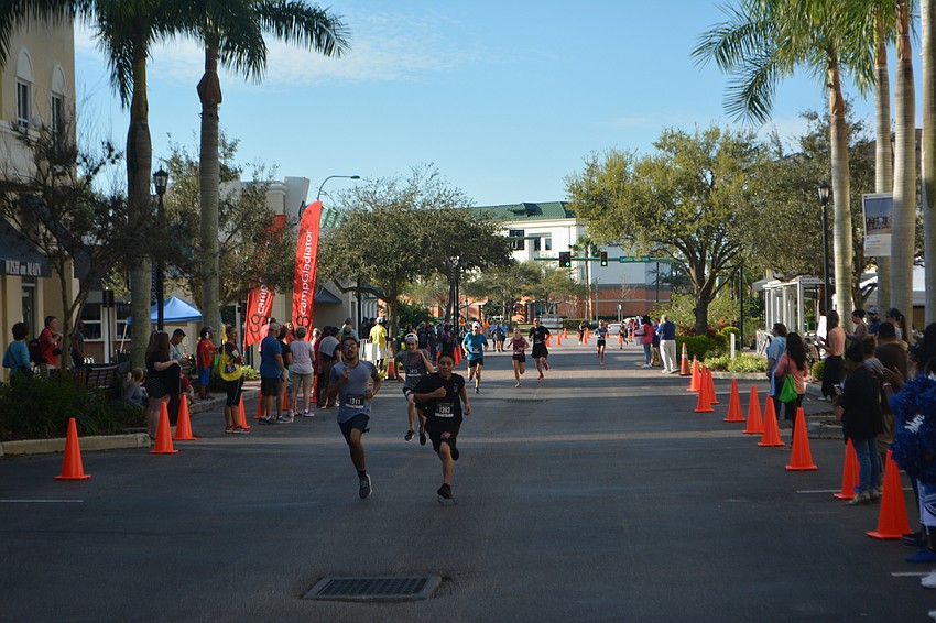 Runners in the 5K head to the finish line.