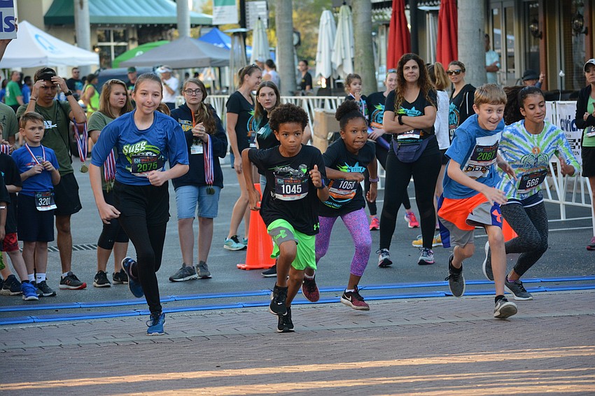 Gullett Elementary's Zachariah Kersey (1045) led the 10-11 age group race from the beginning to the end.