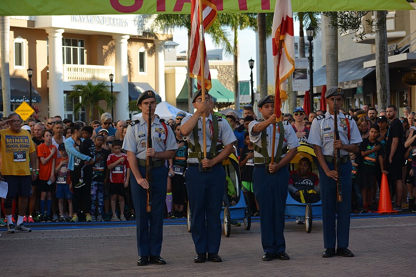 Corey Tonitis, Christopher Camacho, Brandon Canales and Darius Norwood of Palmetto High School present the colors.