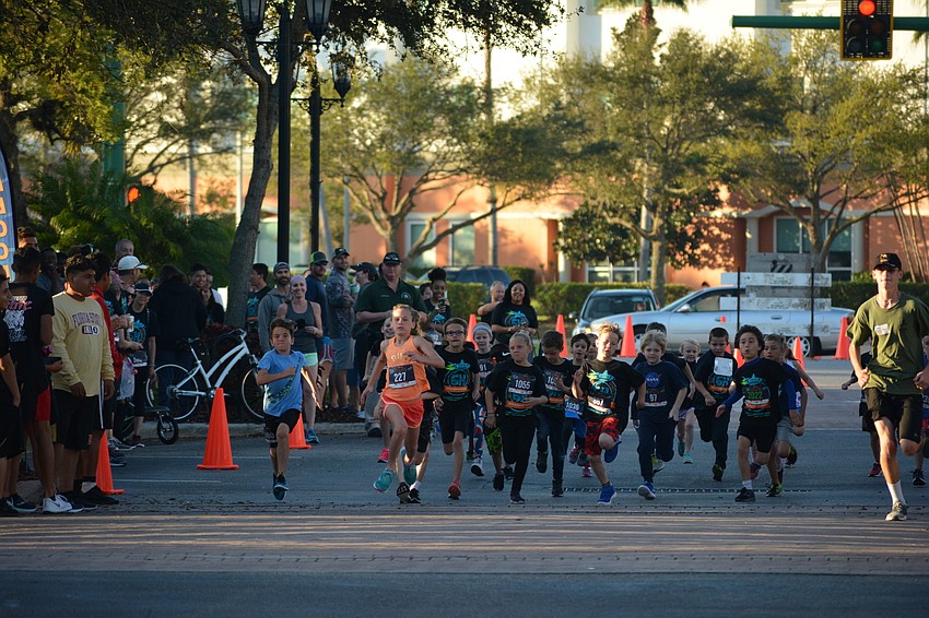 Nine-year-old Sabel Harbour resident Alexis Hutter leads her age group race.