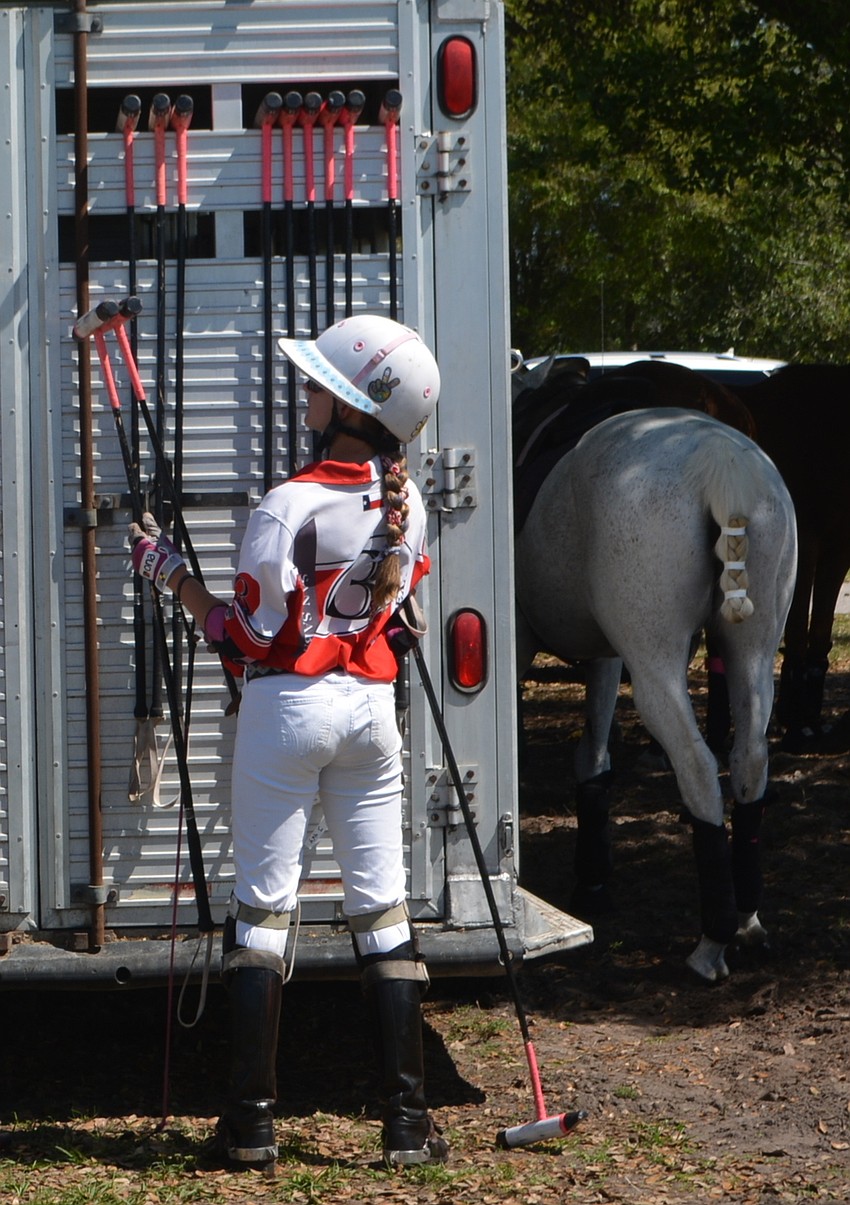 San Saba's Hope Arellano picks her equipment before the match.