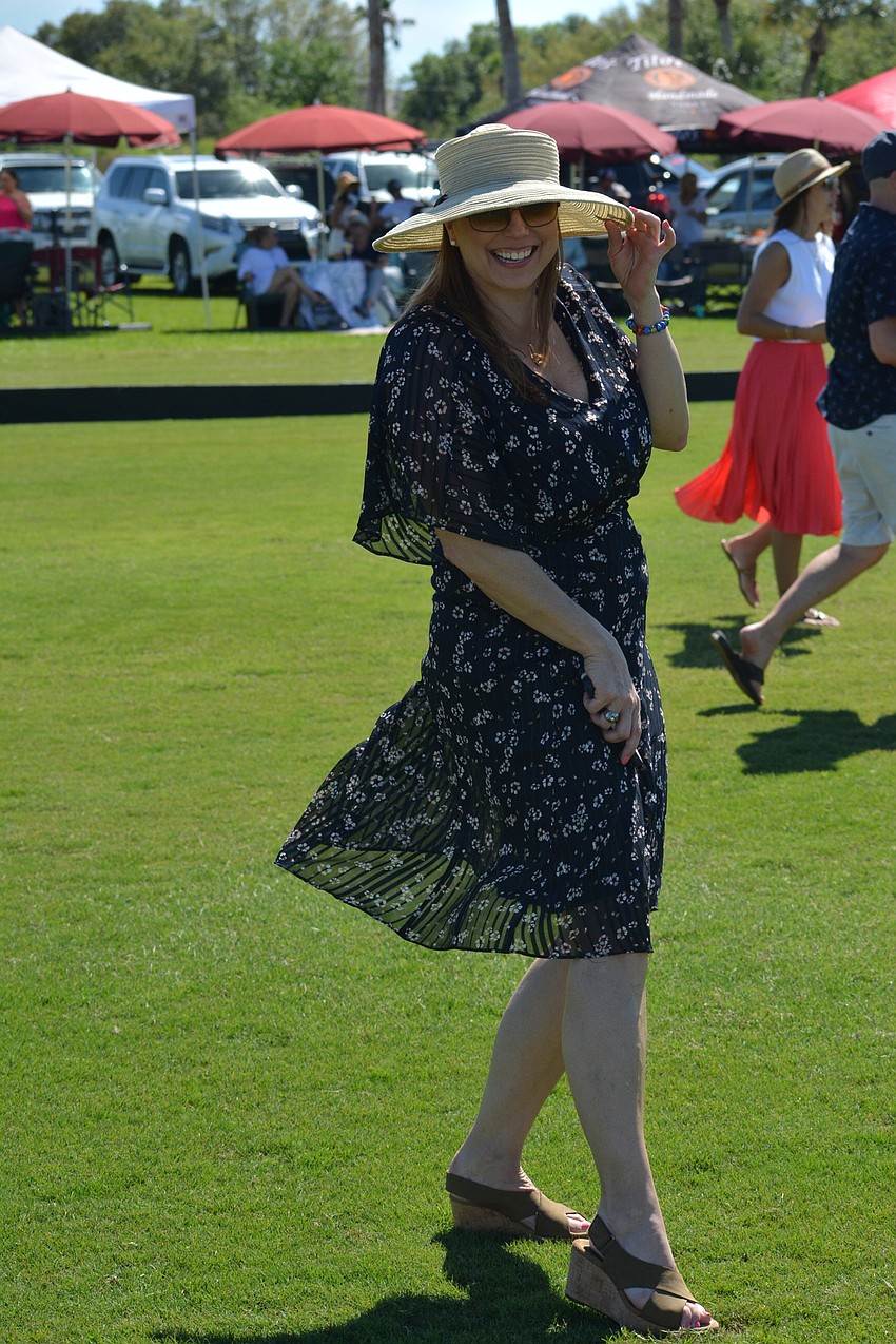 River Strand's Amy Rylott stomps divots at halftime of the match.