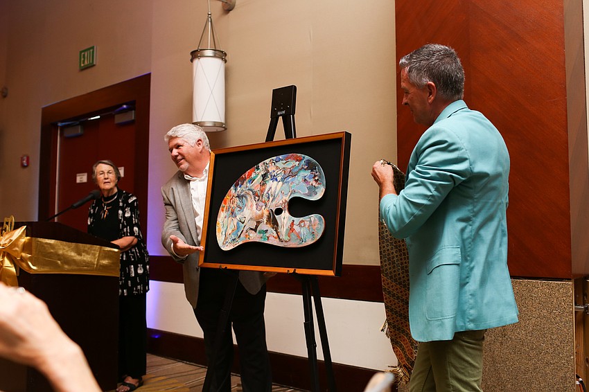 Eric Bowyer and Peter Imrik reveal the newly recovered painting.