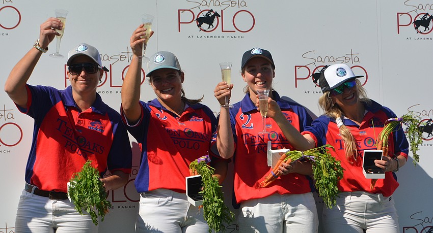 The Ten Oaks team didn't win the match on Sunday, but the players still celebrated with carrots for their horses. From left to right are Sara Wiseman, Tiva Gross, Pippa Campbell and Kelly Beck.