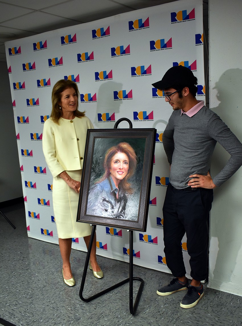 Caroline Kennedy questions Ringling College of Art and Design junior Kevin Cuellar about his painting.