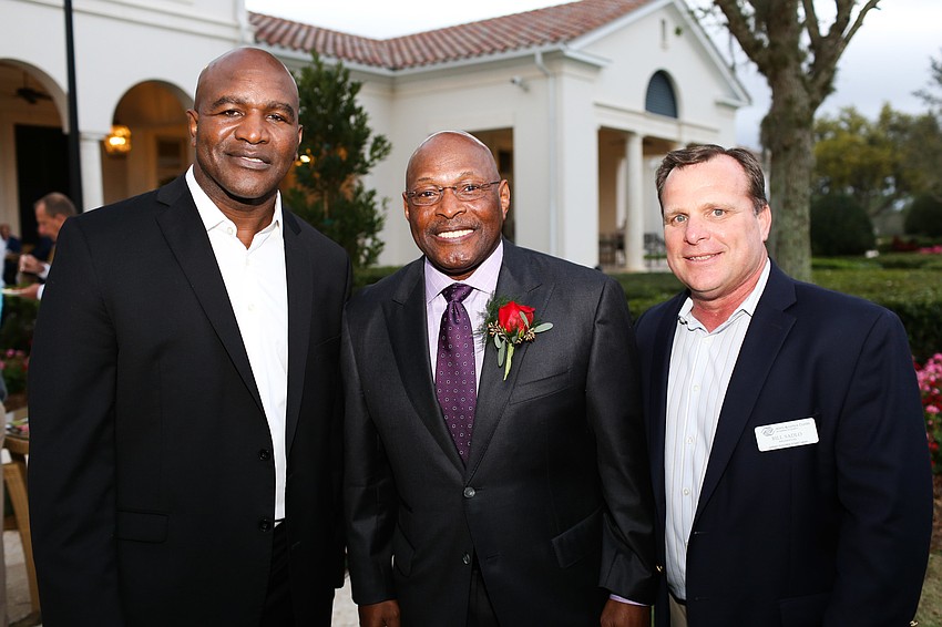 Guest speaker Evander Holyfield, Host Archie Griffin and Boys and Girls Clubs of Sarasota County President Bill Sadlo