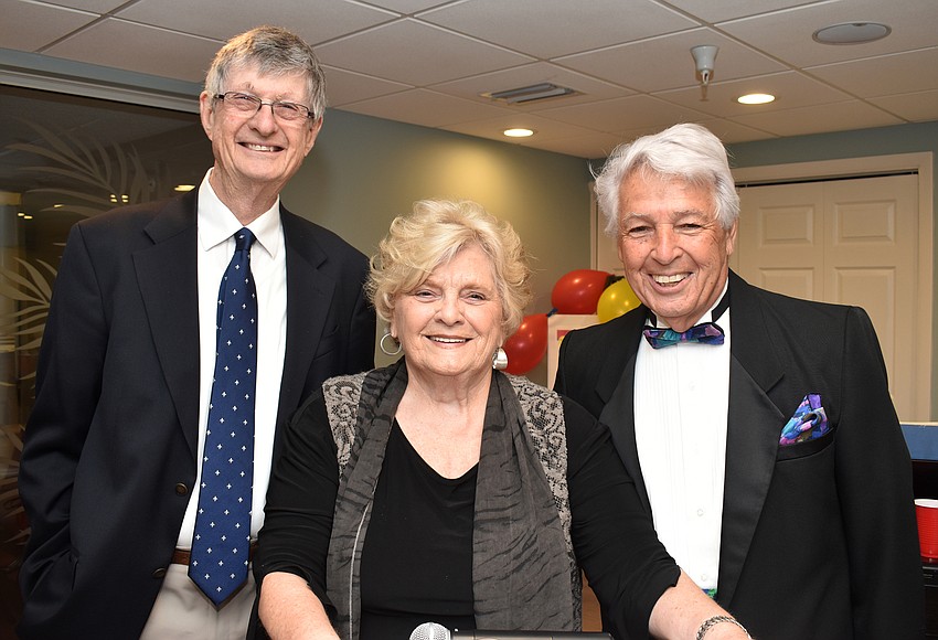 Usher Gene Miller, commentator Martha Miller and usher Tom Vitro