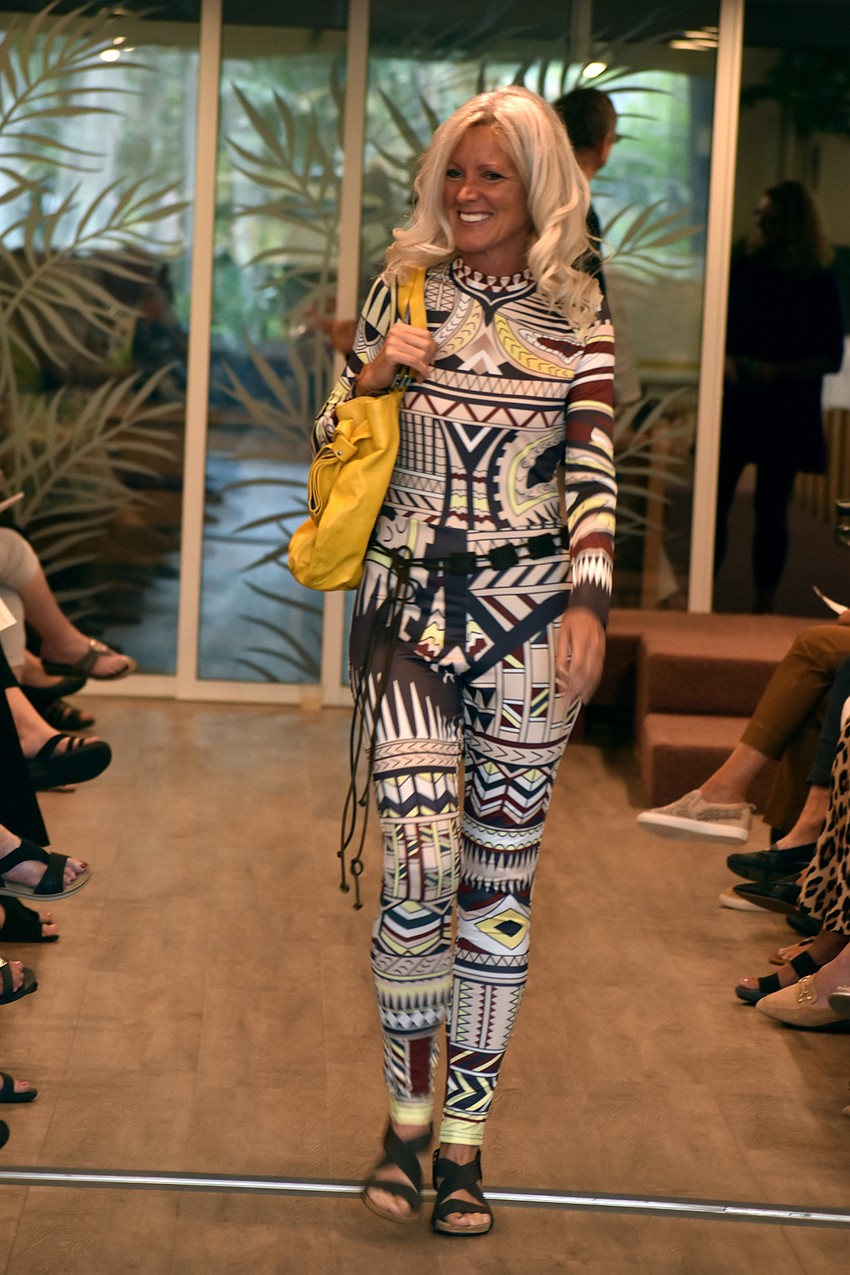 Danielle Bodnar models a geometric jumpsuit.