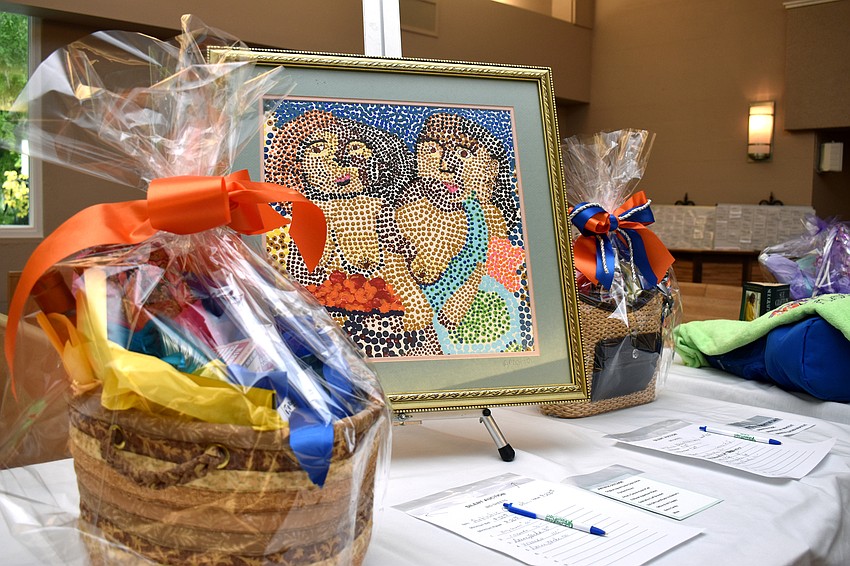 Silent auction items ranged from artwork to gourmet dining sets.
