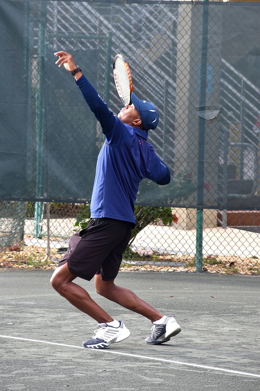 Ron Shields serves the ball during the Battle of the Pros.