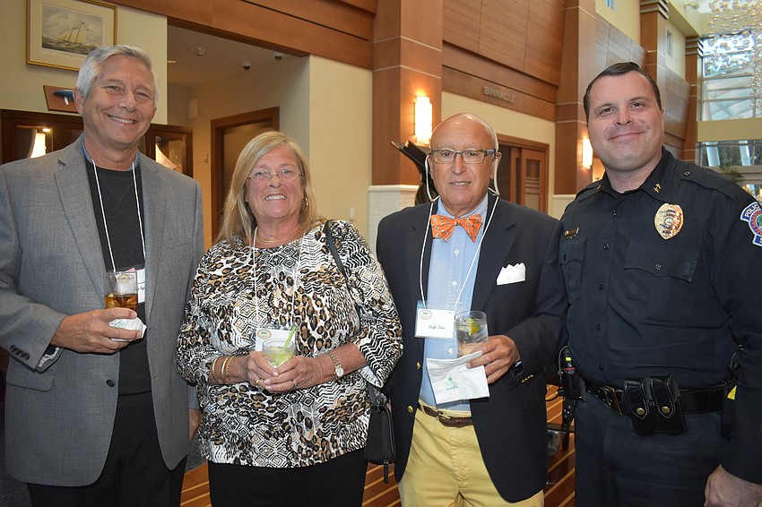 Mark Lyons, Anne Fiore, Hugh Fiore and Sarasota Deputy Chief of Police Pat Robinson