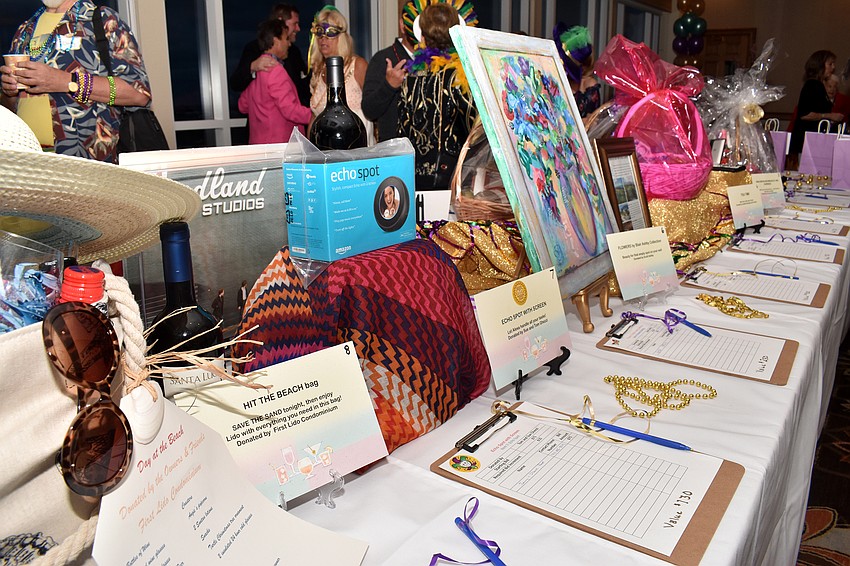 Silent auction items sat in the center of the bar area.