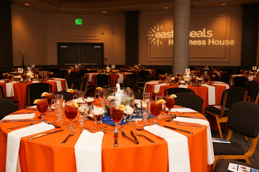 The ballroom radiated orange hues.