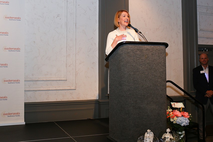 Emily Walsh takes the stage as Emcee.