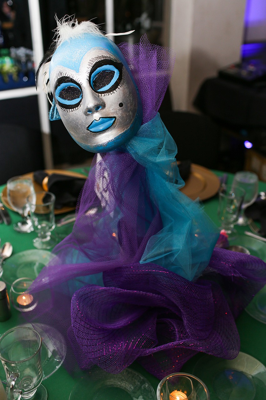 Masks decorated the tables.