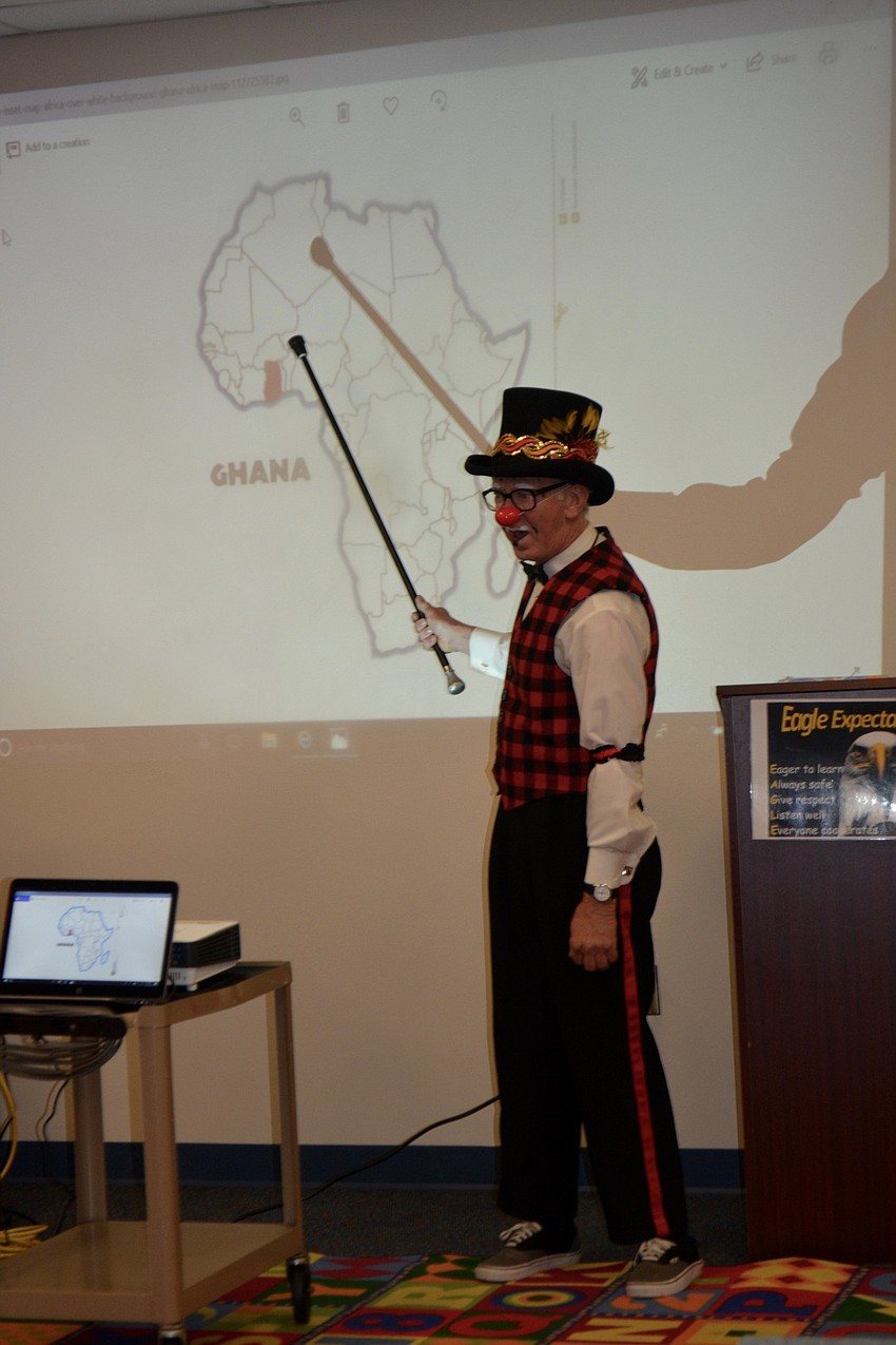Robin Eurich, a local Sarasota clown, explained to the Alta Vista students where Ghana is.