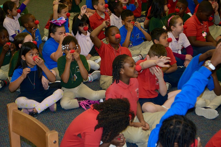 The Alta Vista students donned red noses to demonstrate the circus culture of Sarasota.