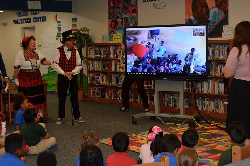 The second-grade students at Alta Vista congregated in the library to Skype with second-grade students in Ghana, who also wore red clown noses.