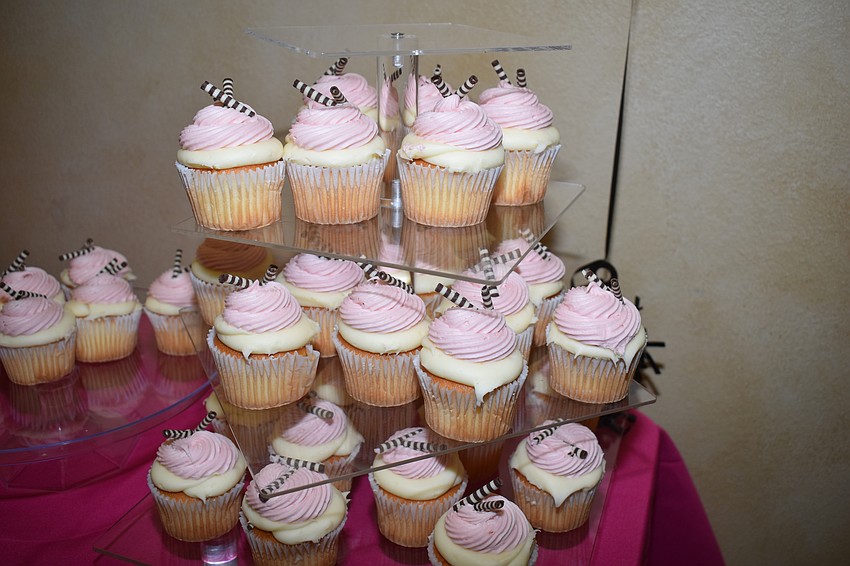 The pink and white cupcakes were served at the event.