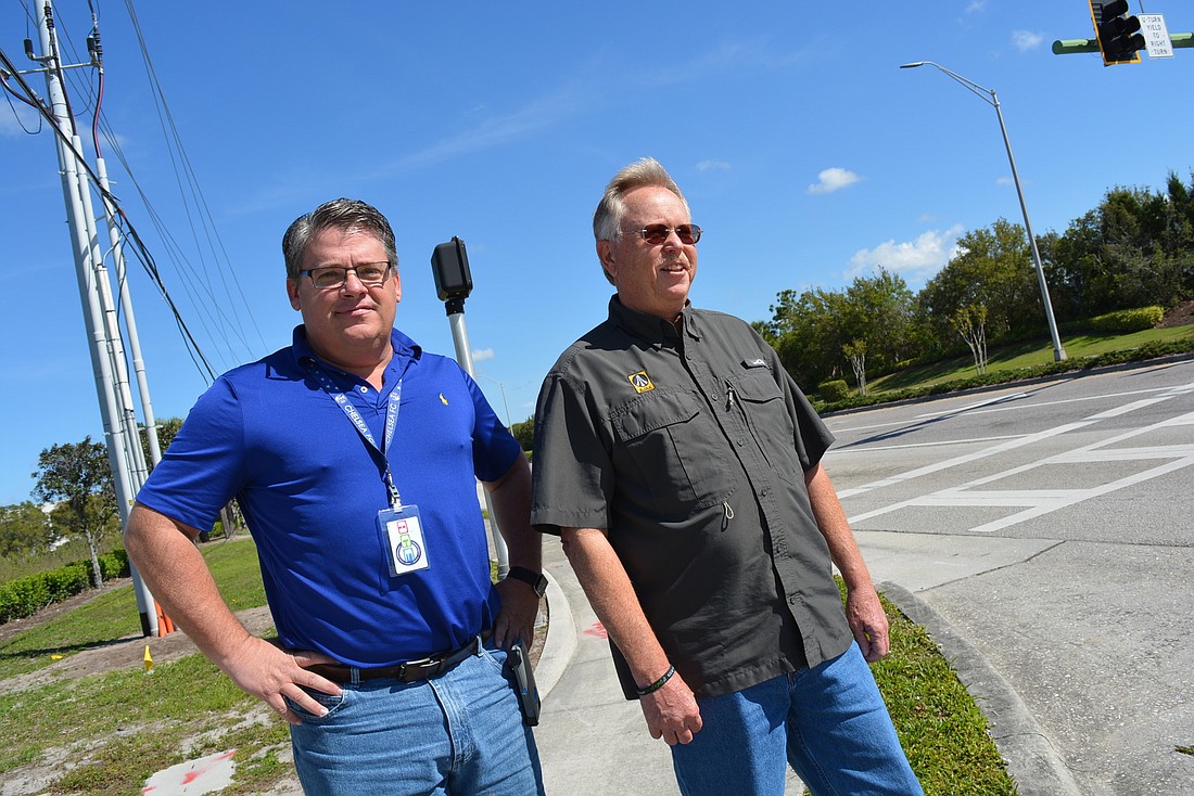 Manatee County Pavement Manager Brian Martineau and Ajax Paving Area Manager Steve Ayers say rebasing sections of Lakewood Ranch Boulevard between state roads 70 and 64 is a "fix, not a bandaid."