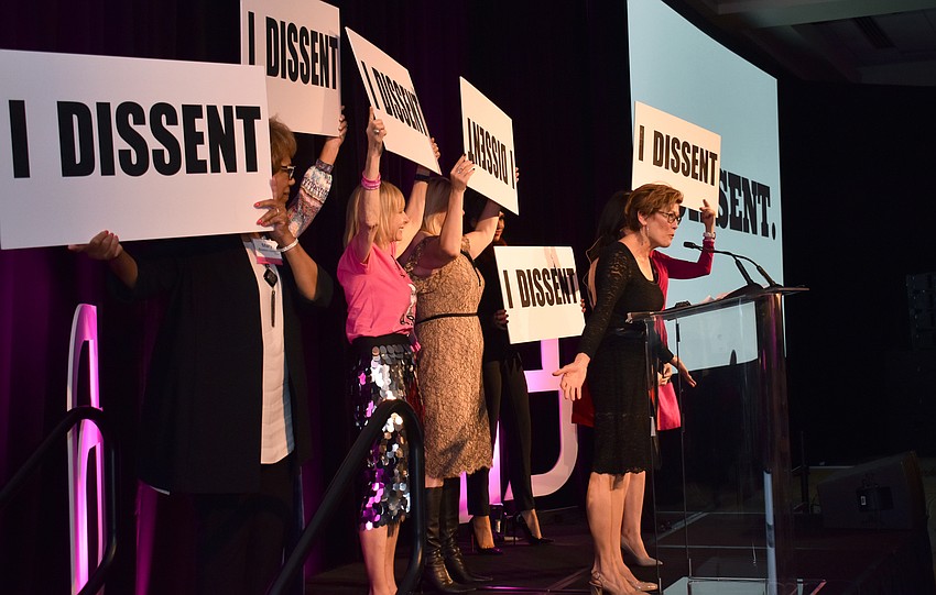 Co-chairwomen and President and CEO Stephanie Fraim joined Carmon on stage at teh end of her speech to chant “I dissent!”
