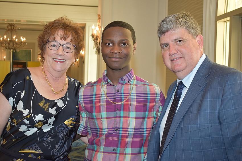Assistant Superintendent Laura Kingsley, Jakobie Green and Superintendent Todd Bowden