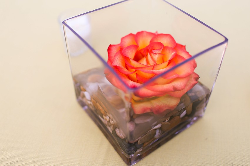 The cocktail tables each were adorned with a centerpiece.