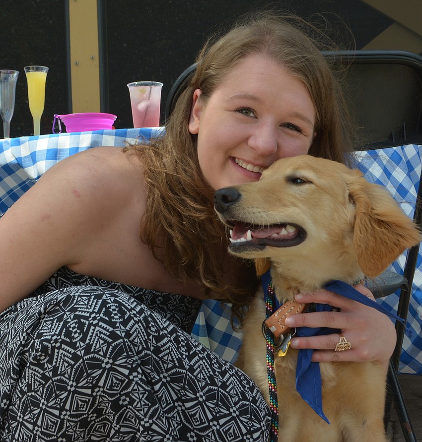 Englewood's Meredith Campbell enjoys her golden doodle, Annabella, who is 6 years old.