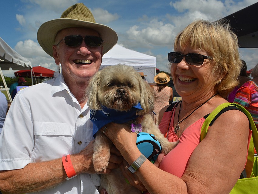 University Park's Lew and Bernie Schaffer hold Katie, a 10-year-old Shih Tzu they adopted as a rescue.