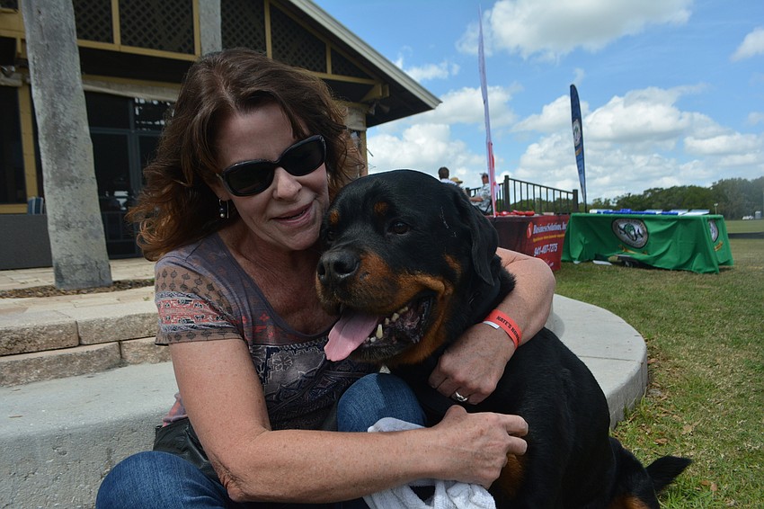 Nokomis' Katy Vanderstel brought Angus, her 6-year-old Rottweiler to the polo match. She is a Nate's volunteer.