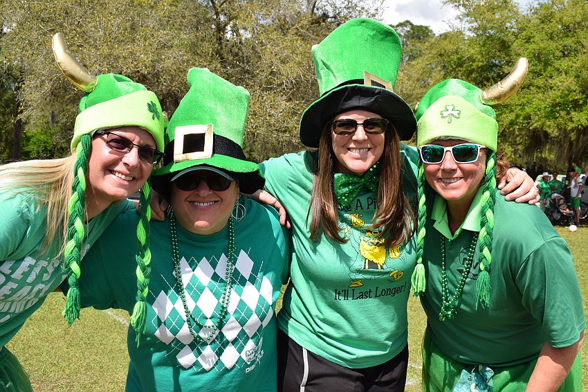 Friends Ruthann Brooks, of St. Petersburg, Lisa Kustra, of the Inlets, Kim Martin, of St. Petersburg, and Laura Smith, of the Inlets, gathered together for the festival.