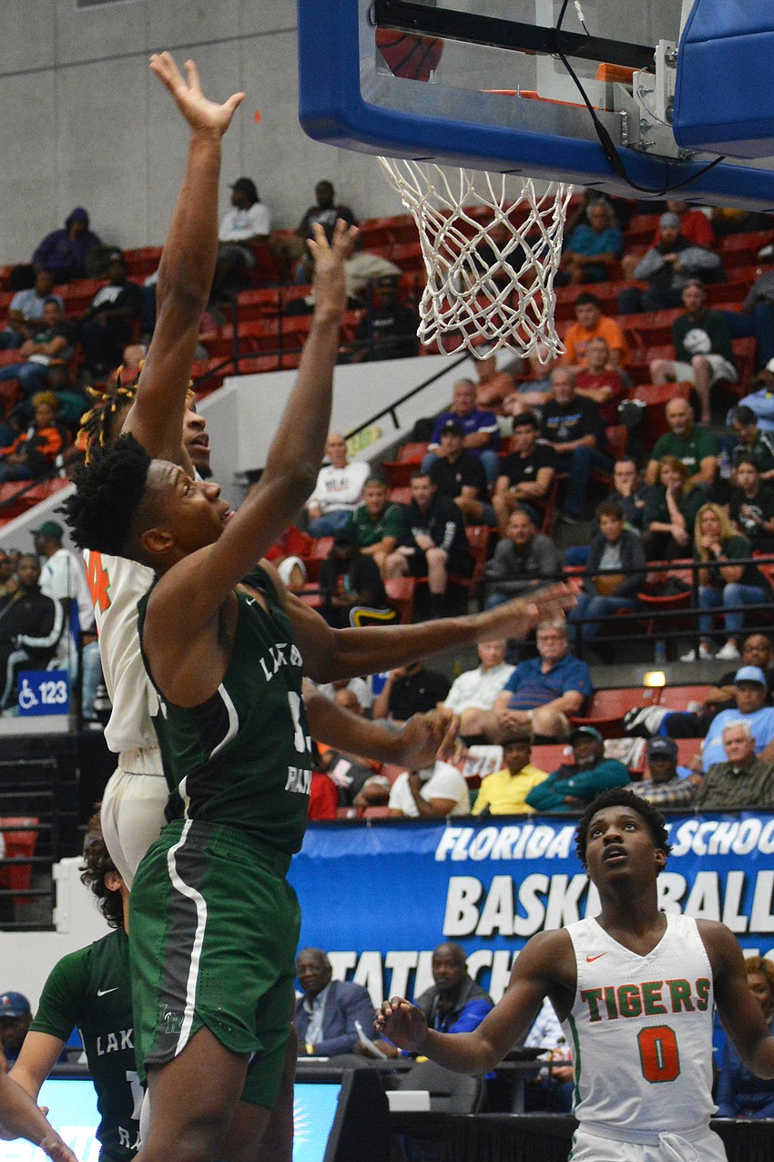 Senior forward Josh Young hits a layup against Blanche Ely. Young finished with 10 points.