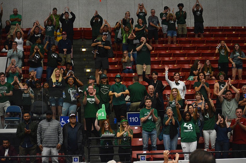 The Mustangs faithful gives the team a hand for a great effort following the loss to Blanche Ely.