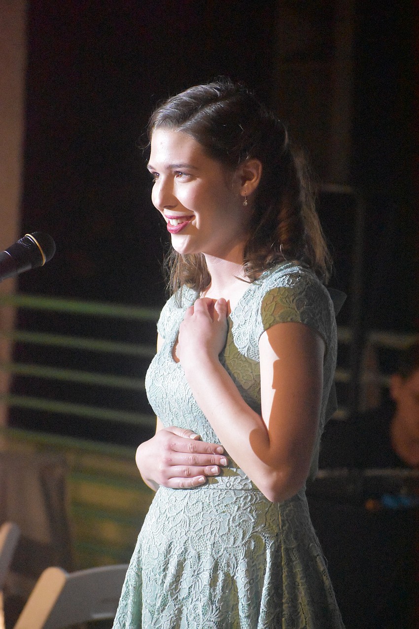 Student Emma Johnson performs a number from 