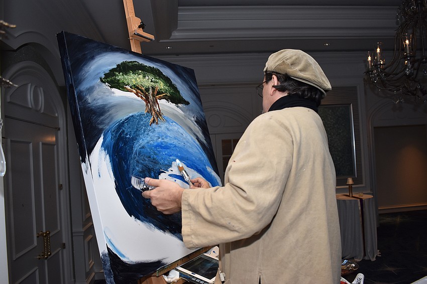 Eric Kagin created a live painting during cocktail hour.
