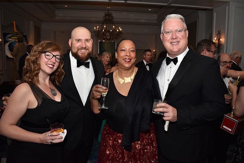 Erin and Jacob Harding with L’Tanya Evans and Darryl Calkins