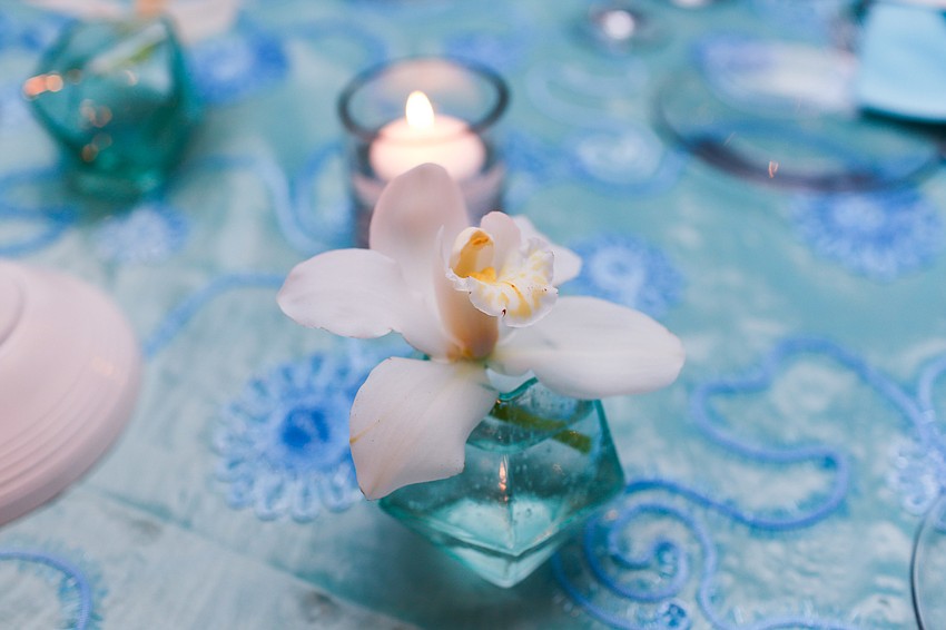 Small orchids decorated the table tops.
