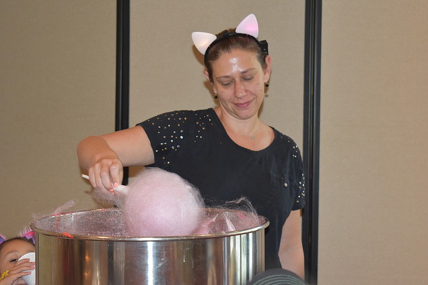 Shana Tibi made cotton candy for event goers.