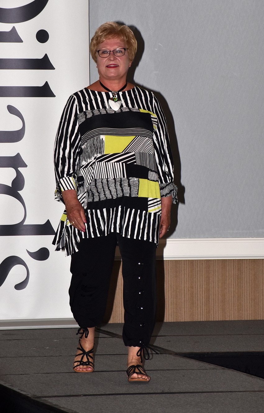 Lee Ann Rosenthal models a patterned tunic and black pants from Dillard’s.