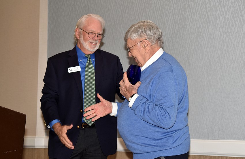 Ken Marsh presents the Blueglass Award for Distinguished Leadership to its first recipient Murray Blueglass.