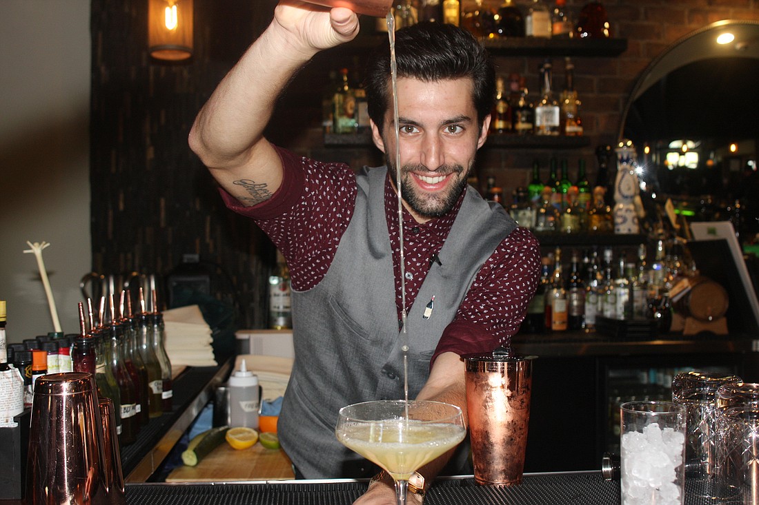 Pittsburgh native Connor Bert previously bartended at local watering holes at Cask Ale and Kitchen and Social Eatery & Bar before Sage. Photo by Su Byron