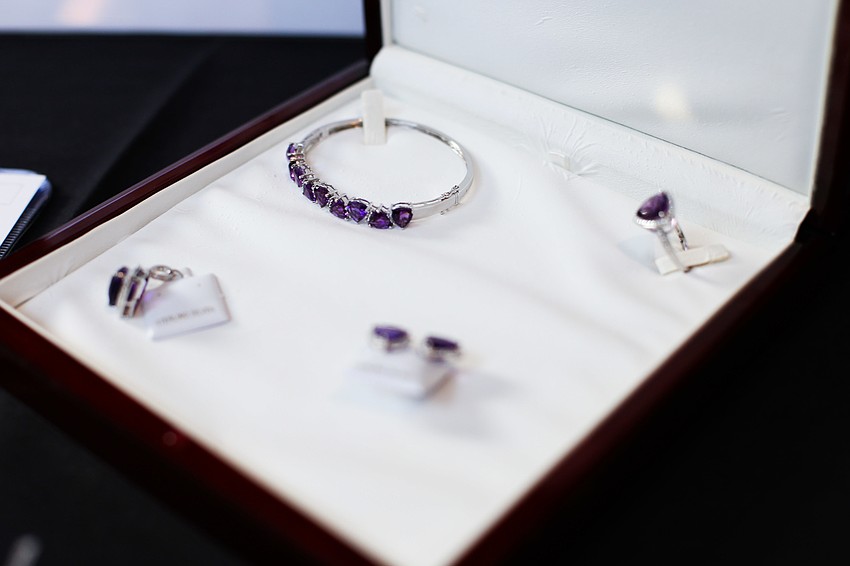 An amethyst jewelry set was one of the auction items.