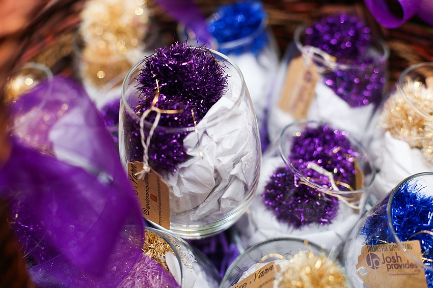 Kelley Jamieson made pompom earrings to sell to guests, with all proceeds going to JoshProvides.